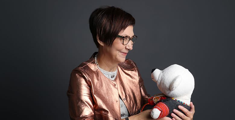 Cindy-Blackstock Holding a baby